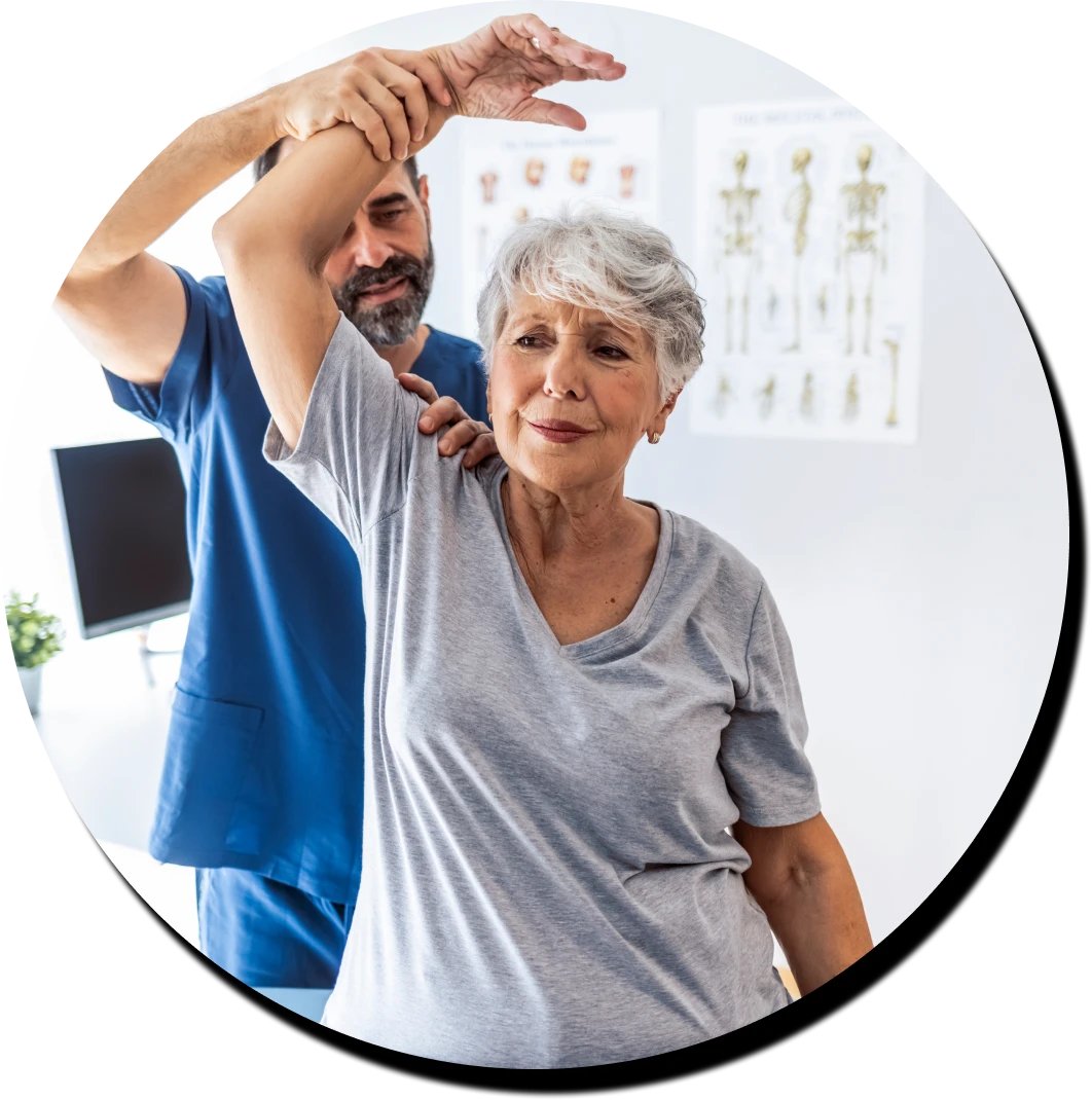 Elderly woman receiving physiotherapy treatment