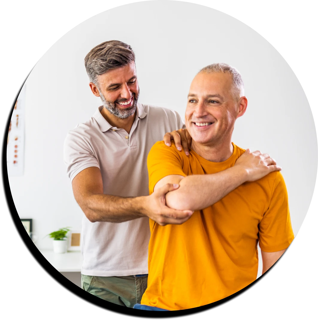 Therapist assisting patient with exercises
